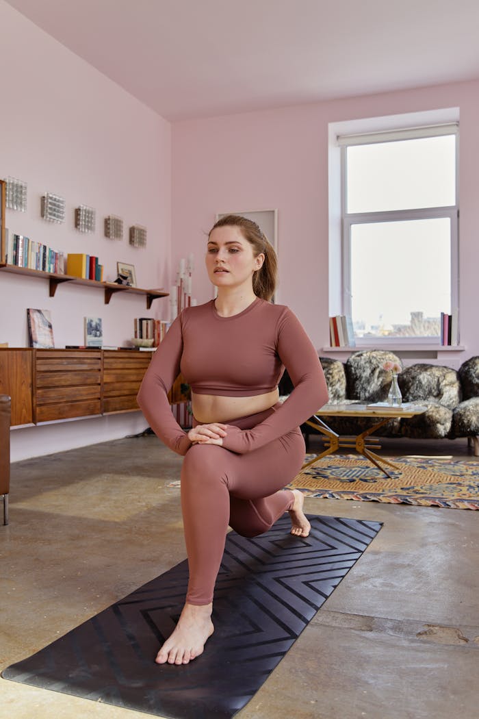 services-01 Woman practicing yoga in cozy home space with natural light